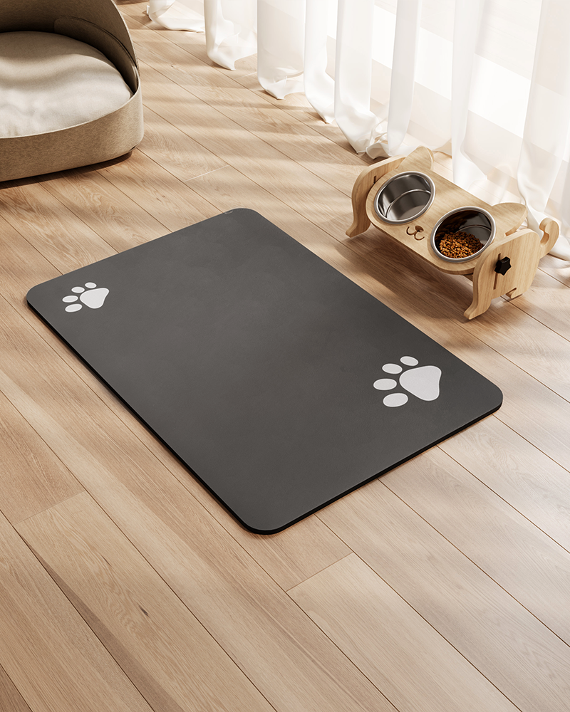 Rubber backed pet feeding mat for dogs and cats, prevents spills and keeps bowls steady.