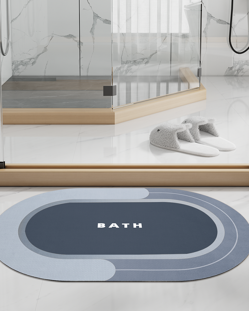 Neutral tone thin bathroom rug that fits under door, anti slip and quick drying.