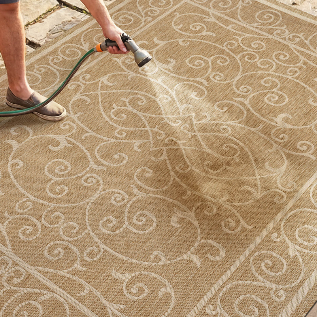 Indoor outdoor rug with all season performance suitable for home and patio environments