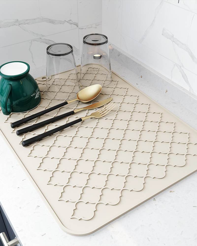 Quick dry silicone dish mat helping keep counters dry