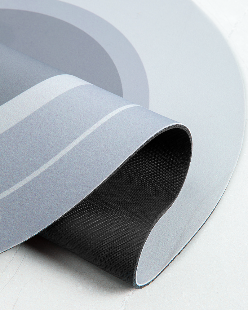 Round bathroom mat created for modern home care, reducing cleaning effort while improving bathroom safety