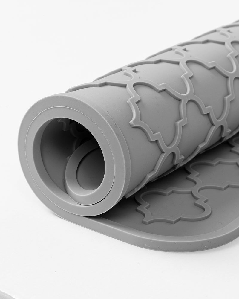 Silicone mat designed for efficient dish draining