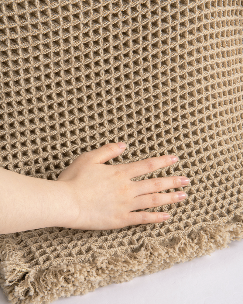 Soft bath mat with three dimensional waffle surface that provides gentle cushioning for barefoot comfort