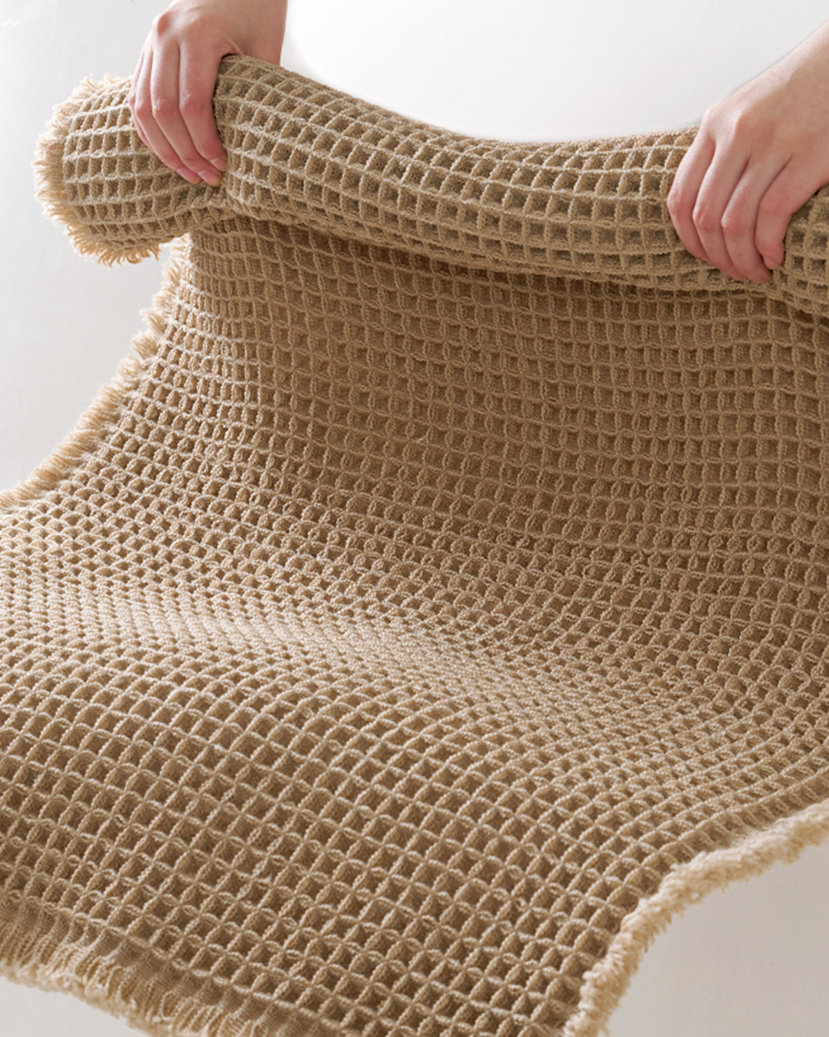 Soft waffle bath mat providing cozy and comfortable feel after shower or bath