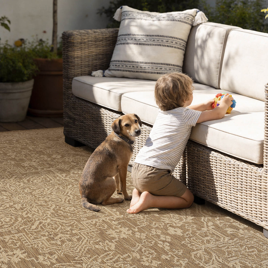 Indoor outdoor rug featuring textured woven design for durability