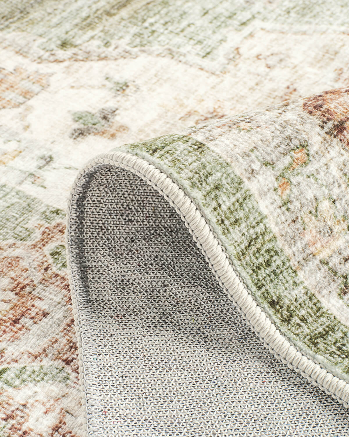 Vintage area rug with non slip backing designed for busy households with pets and kids