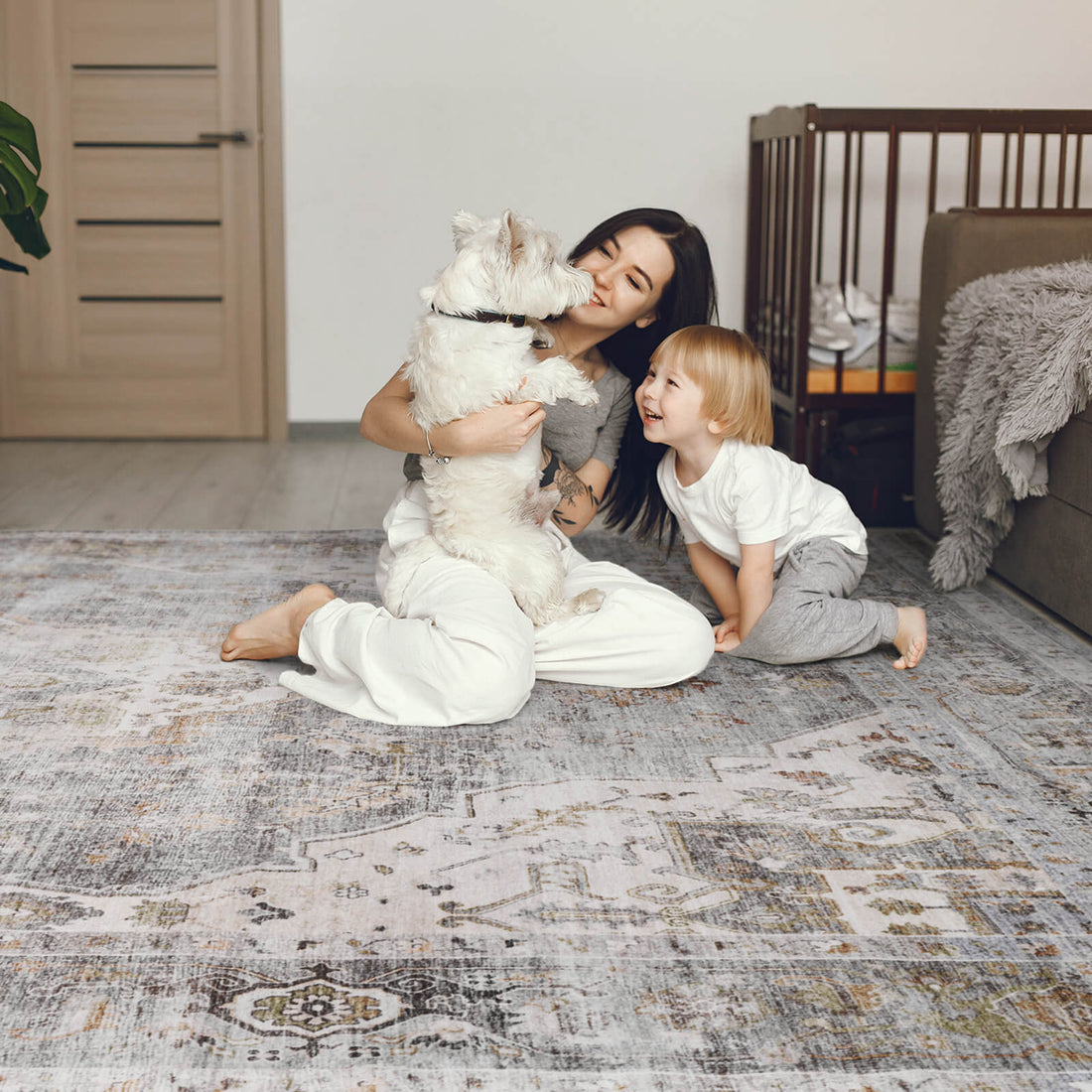 This vintage area rug creates a soft and comfortable space for family time with a washable easy-care surface that is ideal for kids and pets.
