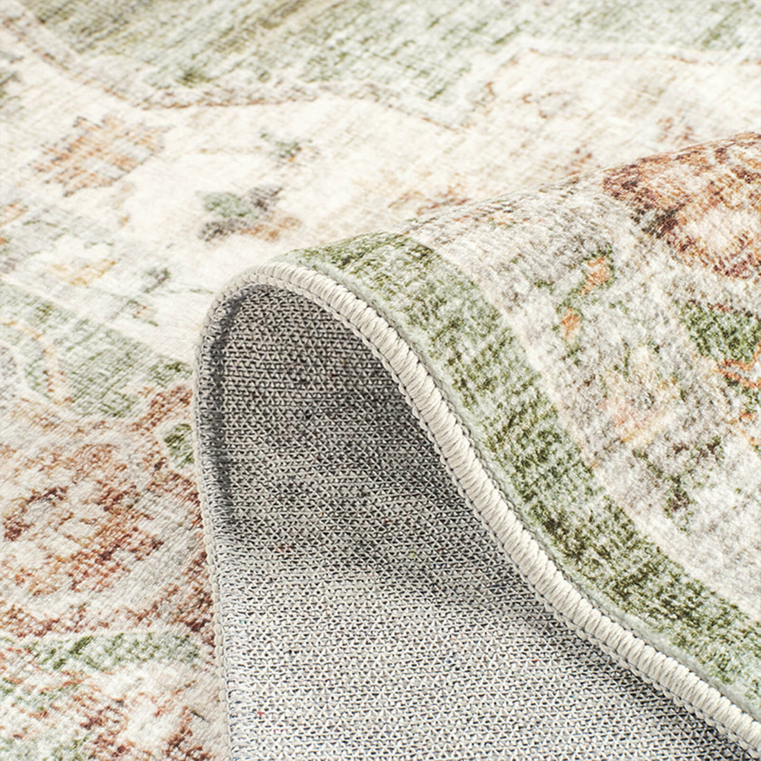 Vintage area rug designed with washable surface and soft comfort for family living