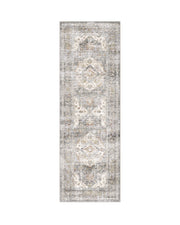 This vintage runner rug features a softly distressed medallion pattern and a washable easy-care design that adds warmth and function to hallways and narrow home spaces.
