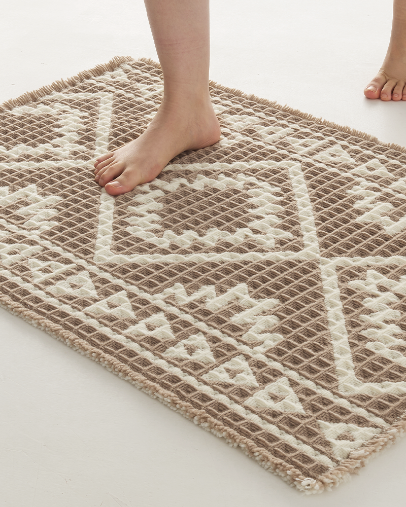 Waffle bath mat with soft visual texture that adds warmth