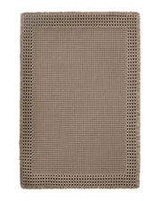 Waffle textured bath mat with absorbent surface that keeps bathroom floors dry and fresh