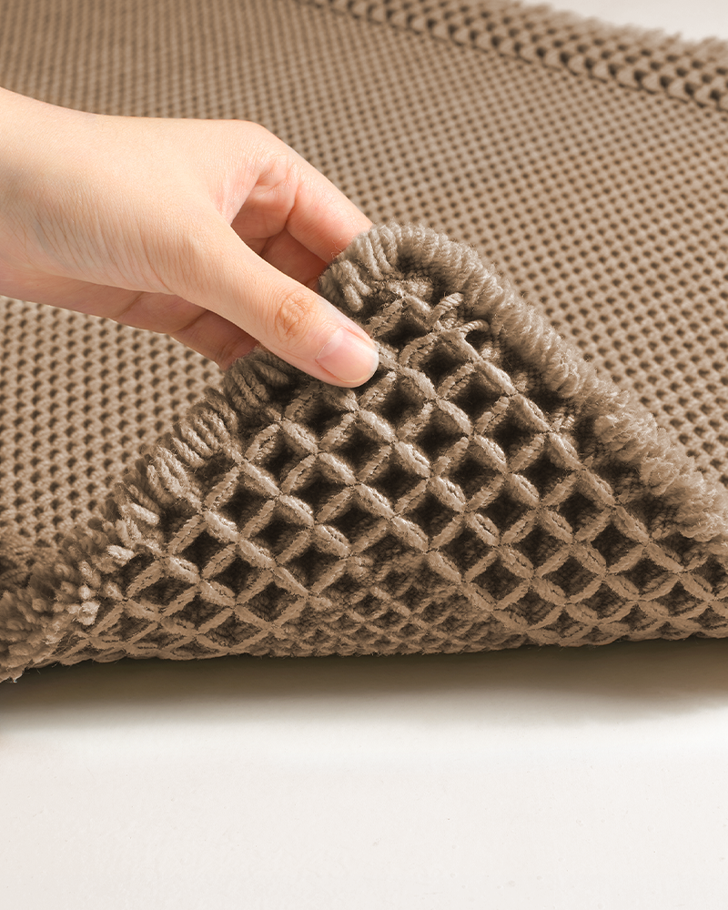 Waffle textured bath mat designed to keep bathrooms feeling fresh and dry