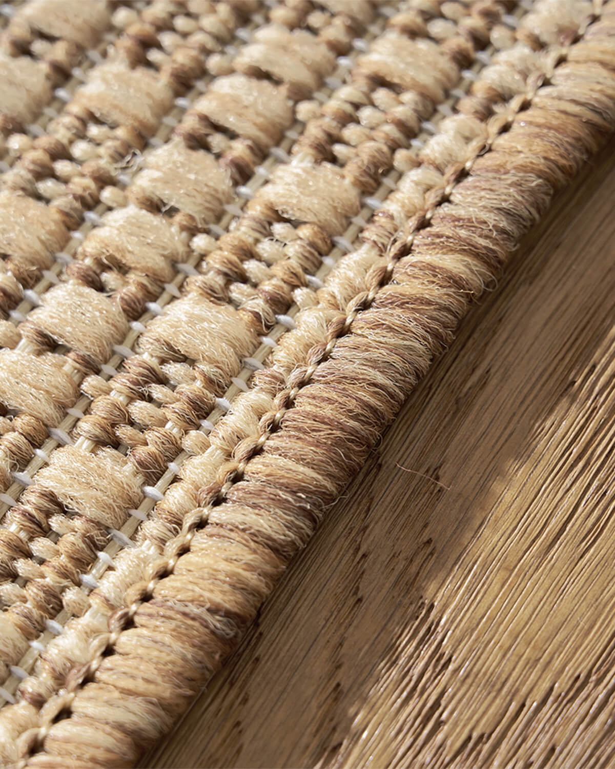 This indoor outdoor rug moves easily between indoor and outdoor spaces, offering washable quick dry convenience for a real home with kids and pets.
