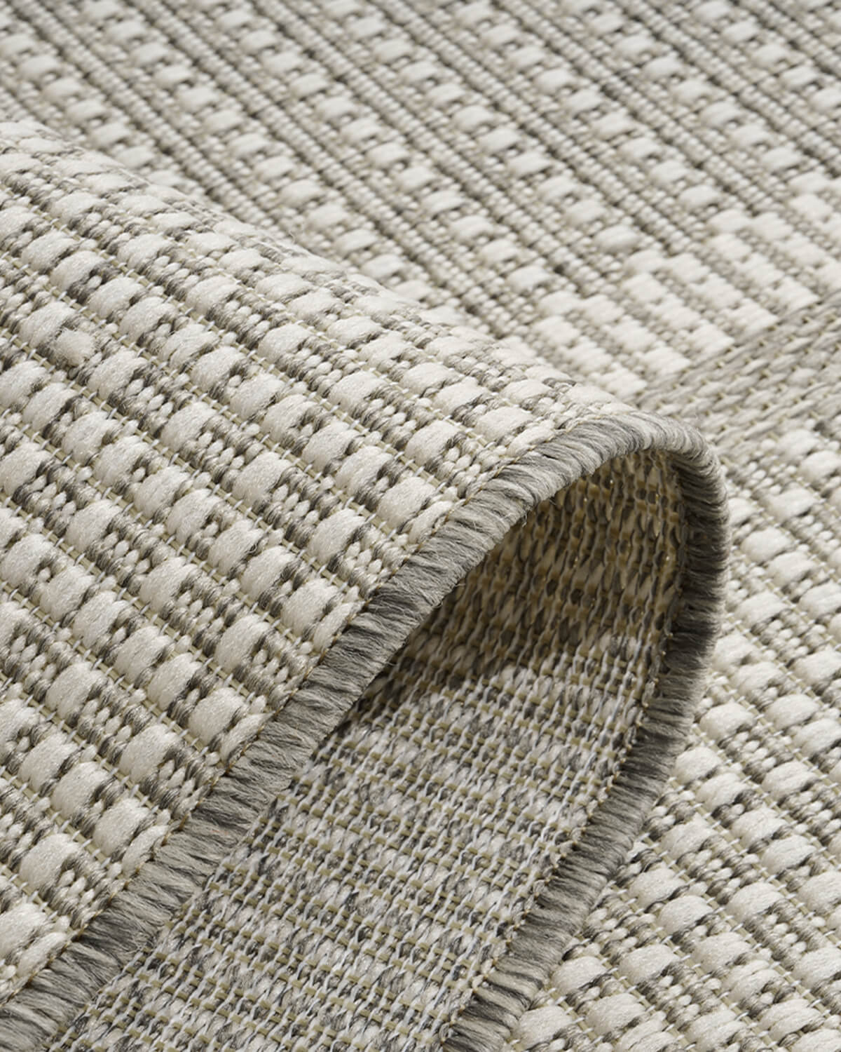 Durable indoor outdoor rug featuring low maintenance design